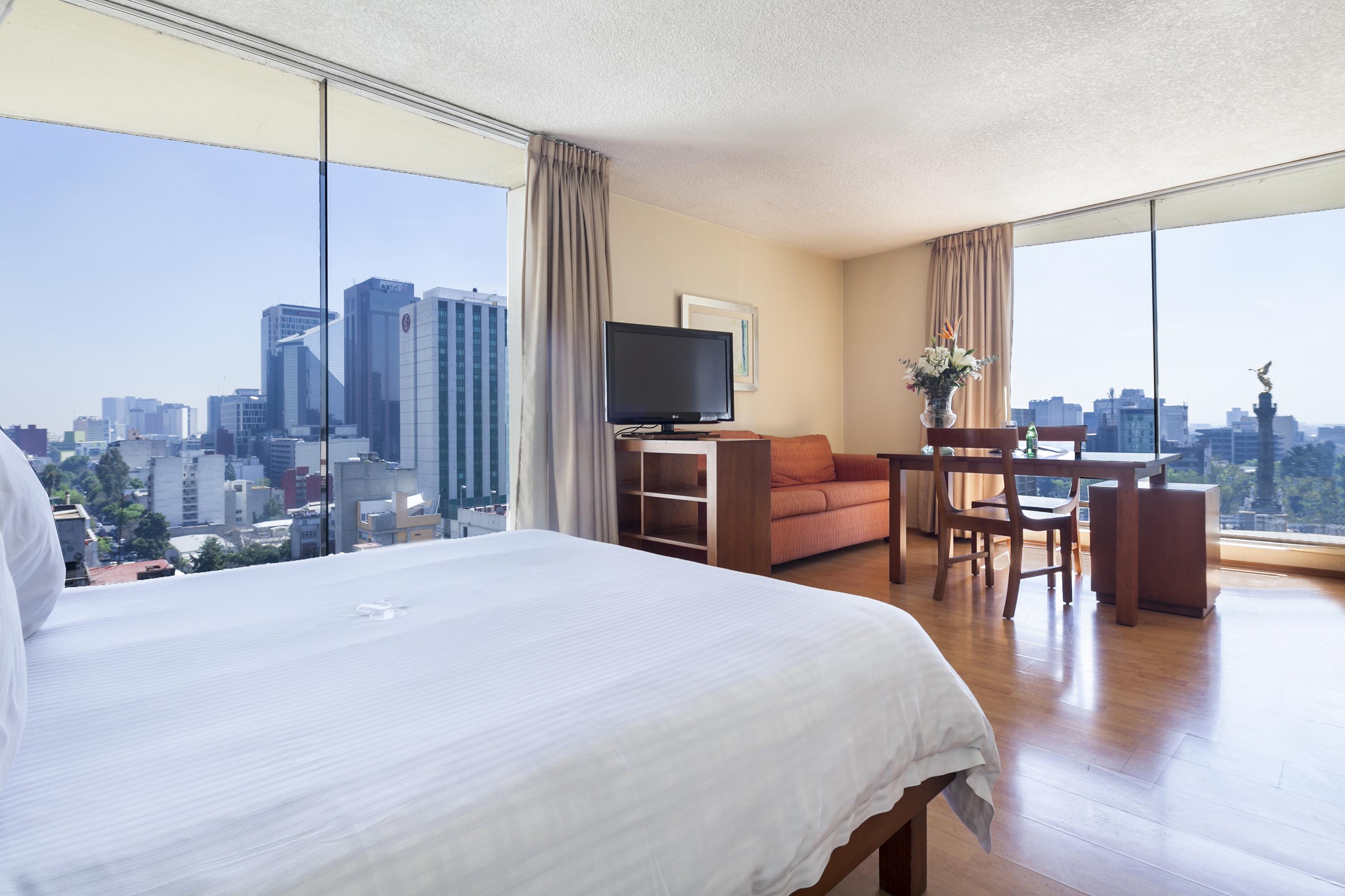 เอ็กเซ สวีท ซาน มารีโน Aparthotel เม็กซิโกซิตี้ ภายนอก รูปภาพ A room at the hotel